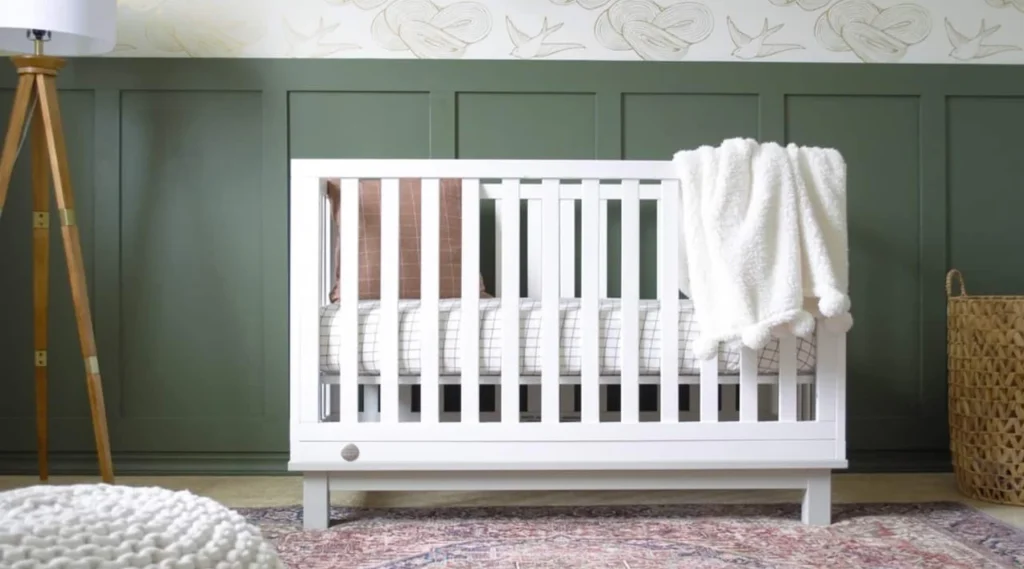 a baby crib in the nursery room